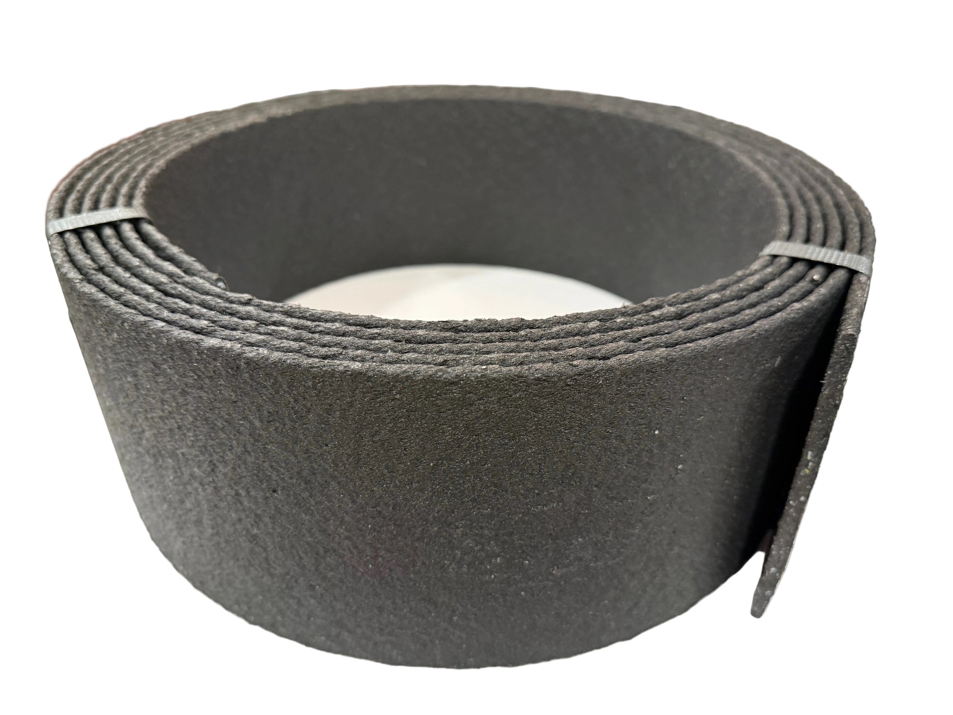 Roll of Thin Bender Board in black on a white surface.