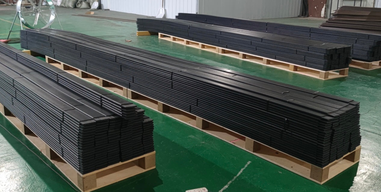 Black bender boards sitting on a pallet